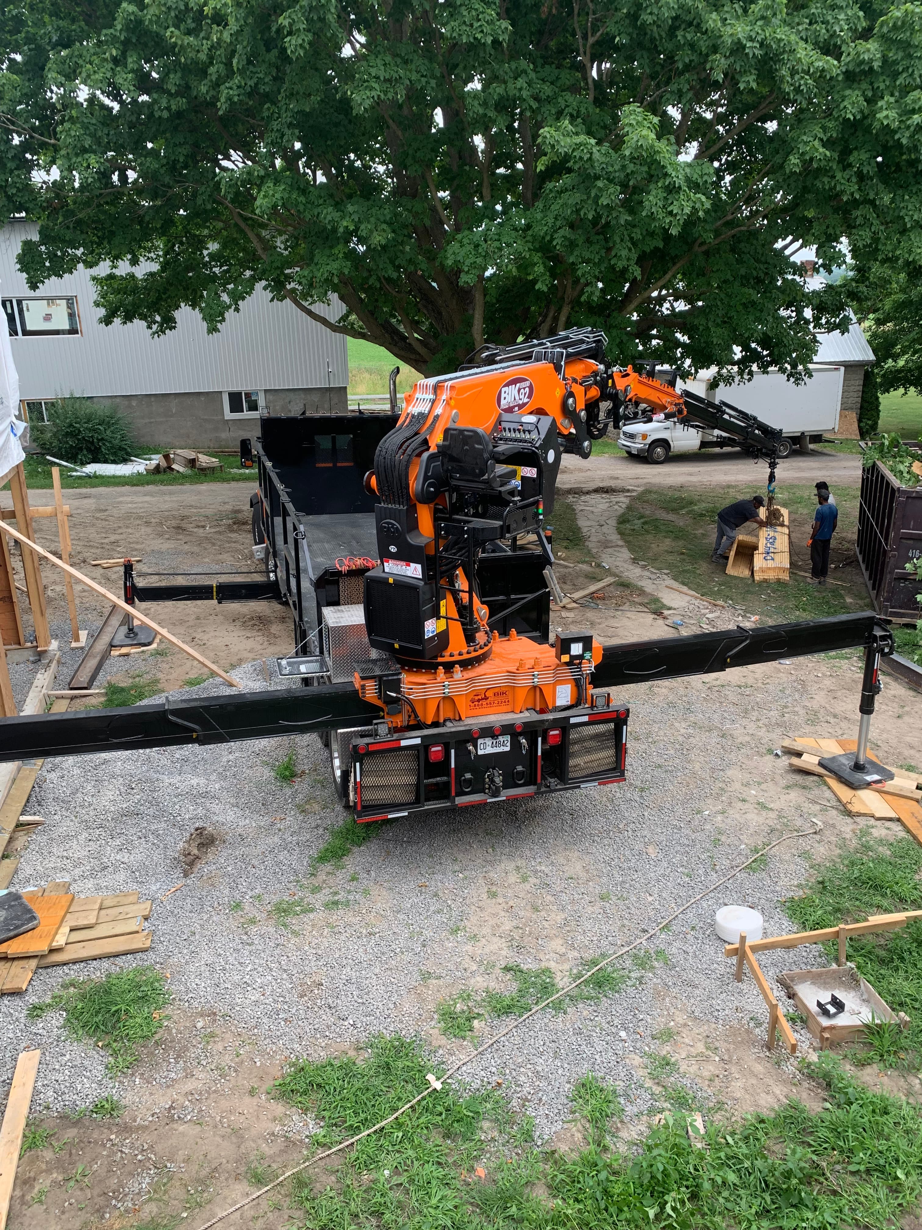 Our knuckle boom demonstrated its versatility by knuckling under the tree to access the trusses for client